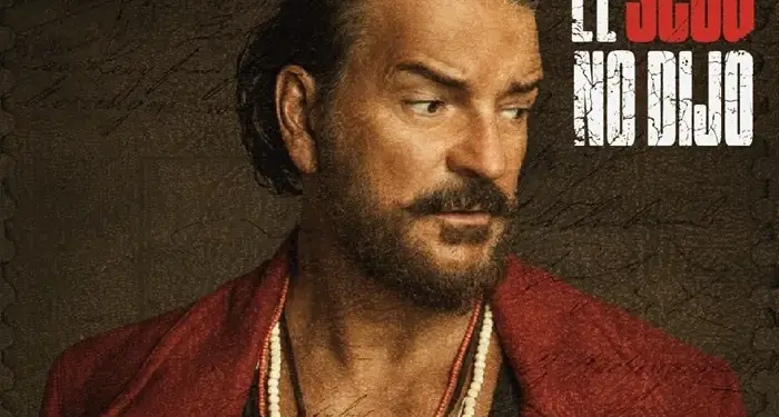 Retrato de un hombre con barba y chaqueta roja, acompañado de texto publicitario y logotipos corporativos.