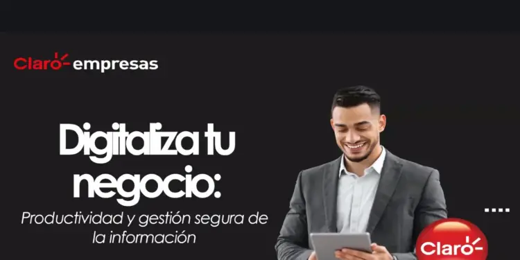 Hombre sonriente en traje gris con tablet, frente a texto 'Digitaliza tu negocio: Productividad y gestión segura de la información' y logos de Claro.