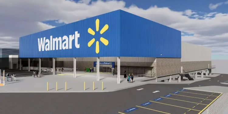 Vista exterior de una tienda Walmart moderna con su distintivo logo azul y amarillo. Clientes entran y salen, con un amplio estacionamiento.