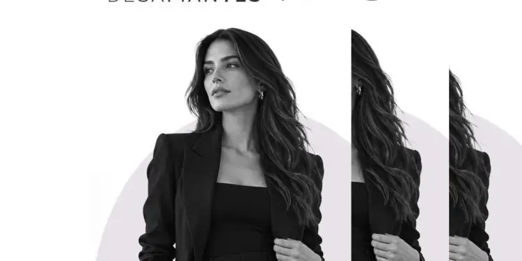 Mujer de negocios con traje formal en blanco y negro para la décima edición de Mujeres Desafiantes.
