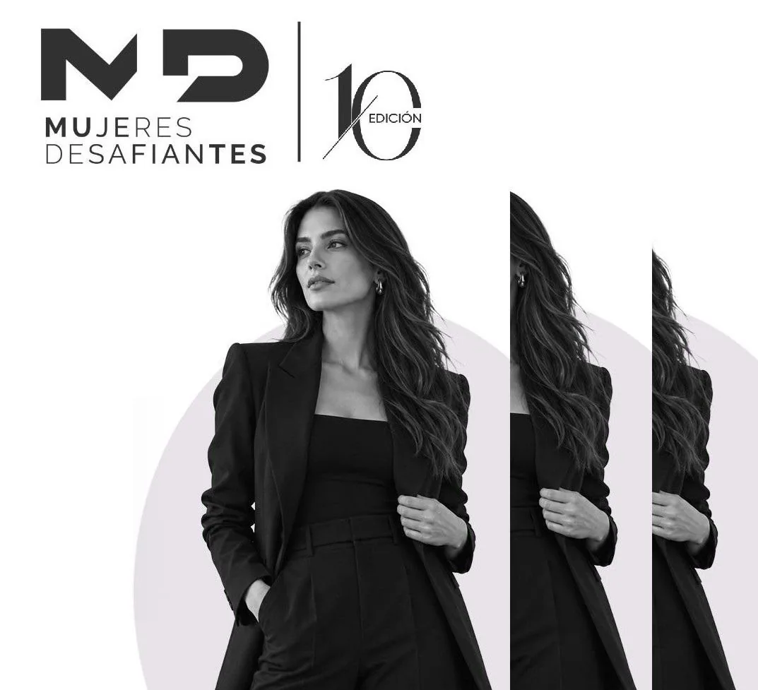 Mujer profesional en traje negro con cabello largo, mirando a la izquierda. Logo 'MD Mujeres Desafiantes 10ª Edición'.
