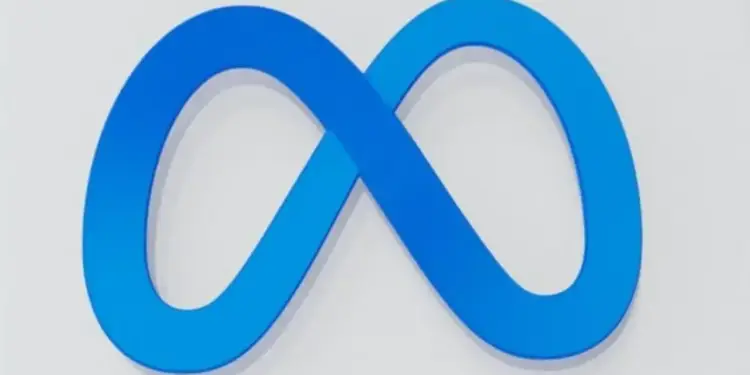 Representación visual del logotipo en forma de infinito de color azul sobre un fondo claro y neutro.