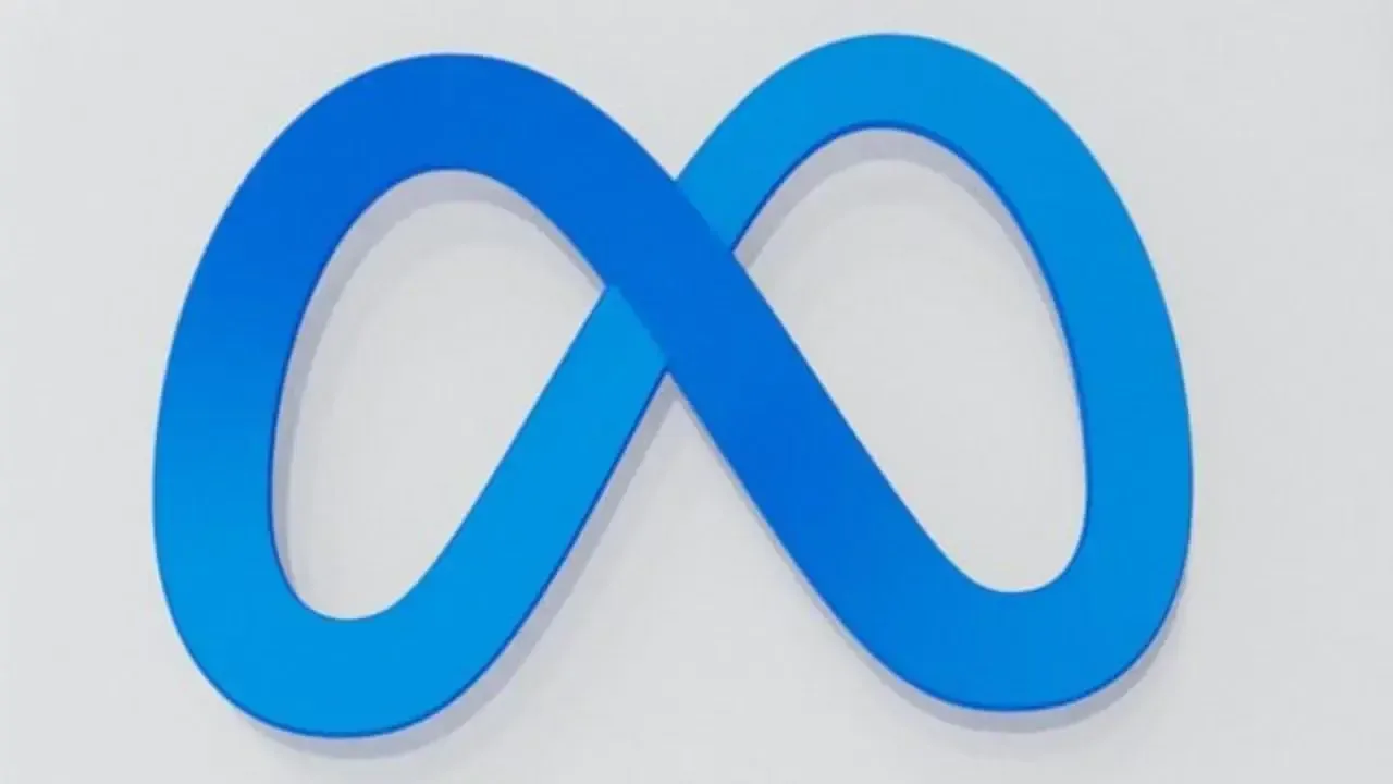 Representación visual del logotipo en forma de infinito de color azul sobre un fondo claro y neutro.