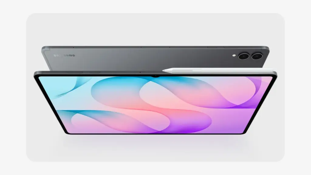 Vista superior de una tablet gris con pantalla colorida y un lápiz óptico blanco junto a otra tablet idéntica.